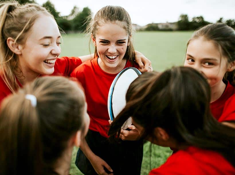 Group of girls playing rugby